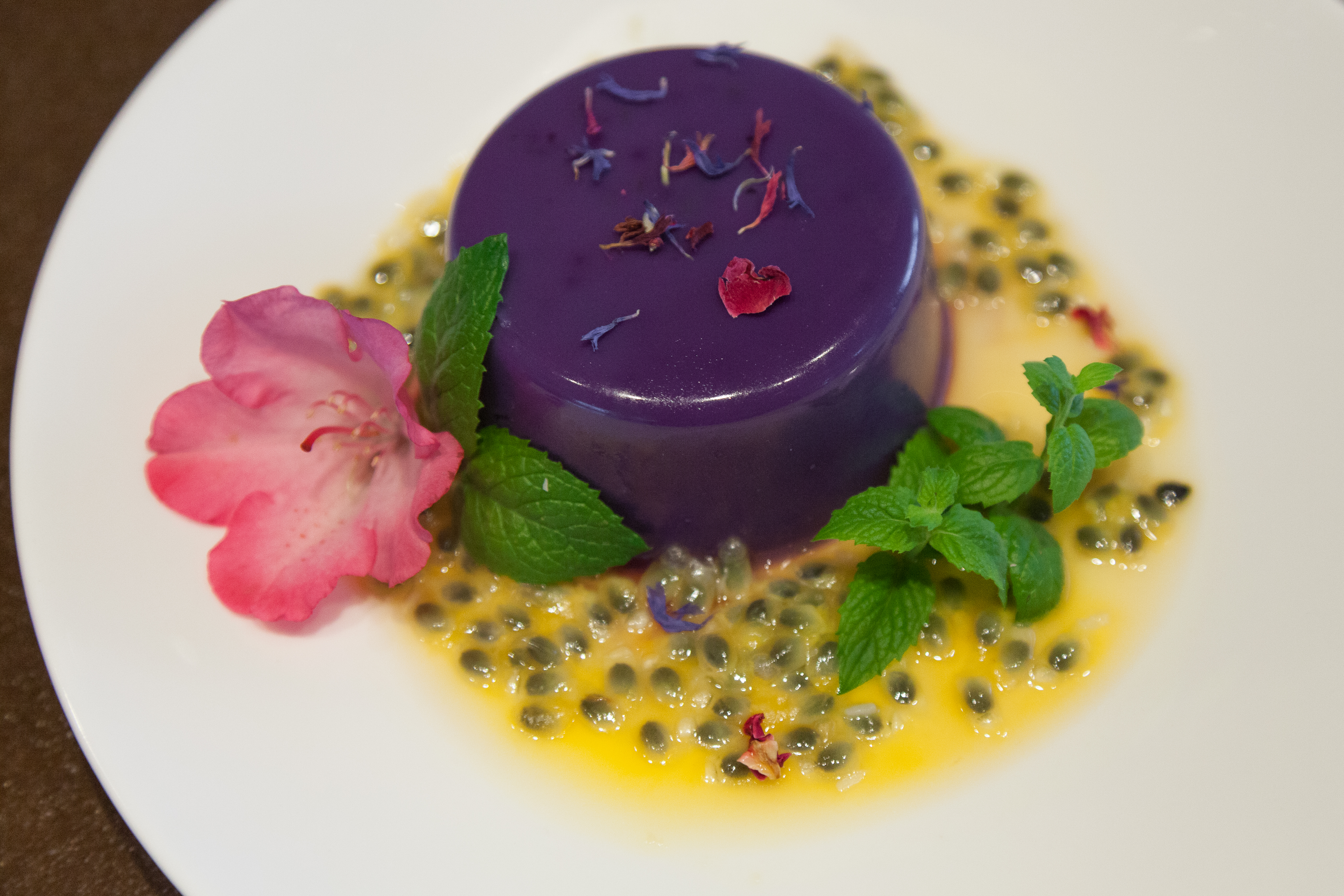 Purple panna cotta with passionfruit